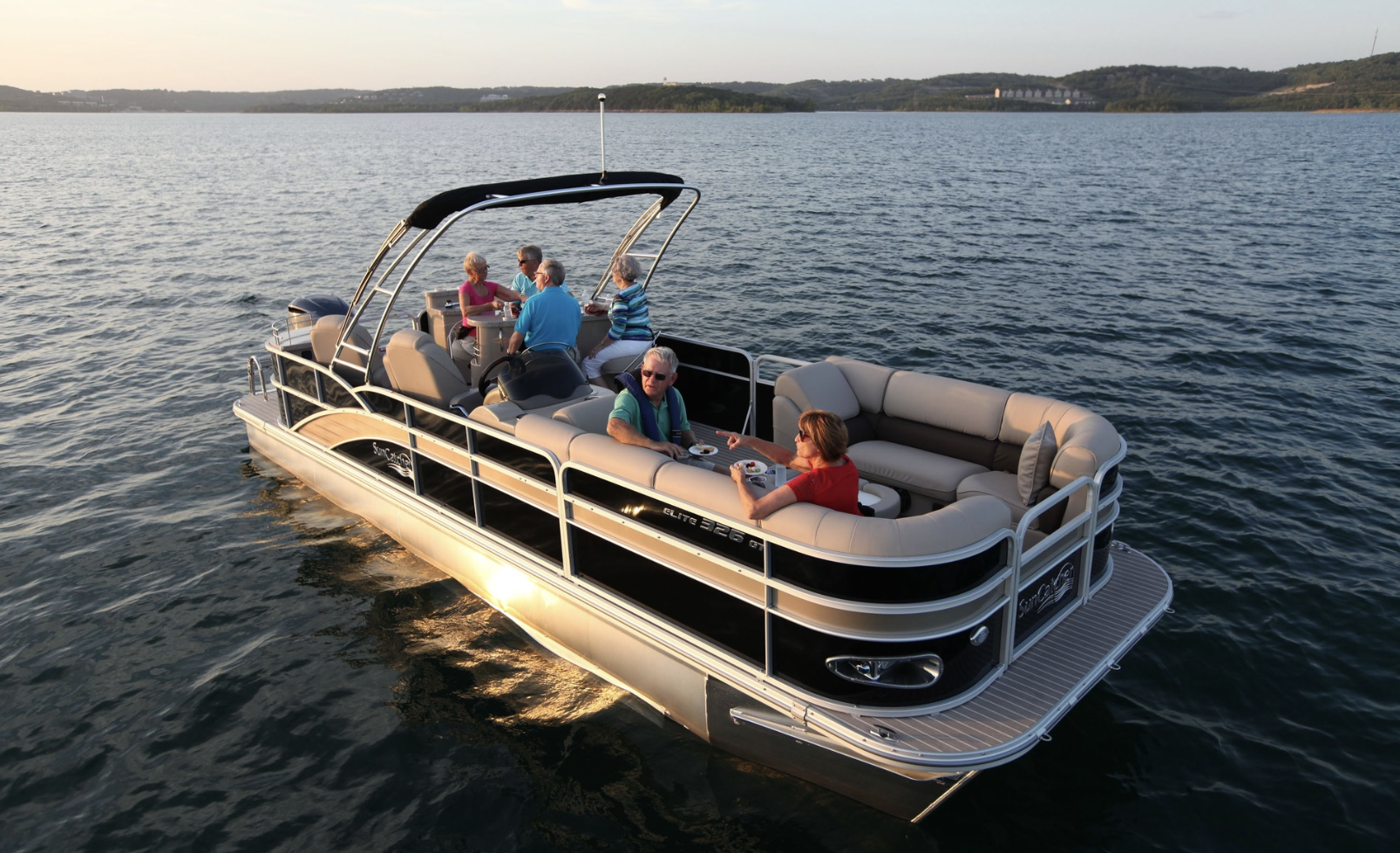 family on pontoon boat