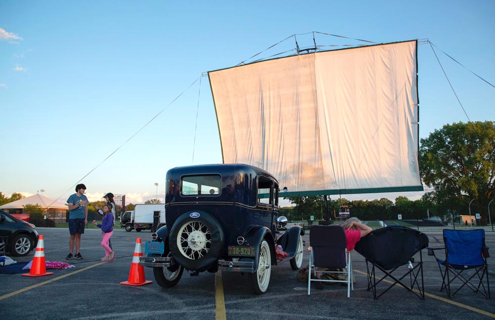 old car at drive in movie